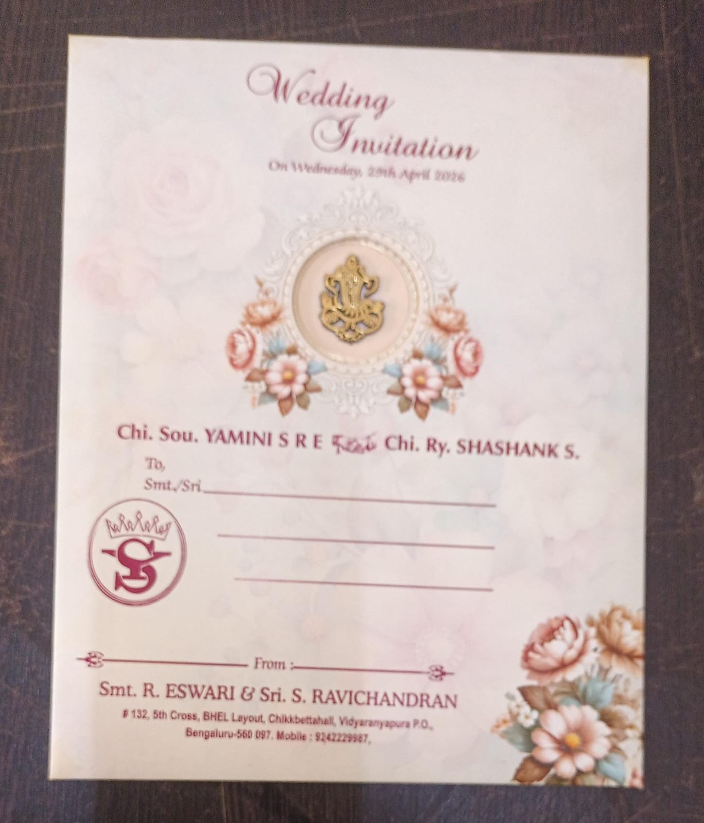 A customised invitation card with an illustrated floral design